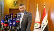 Judge Haider Hanoun, head of the Federal Authority of Integrity, speaks to the press in Baghdad on January 3, 2023, to announce the recovery of four billion Iraqi dinars, the equivaliant of $2.6 million, reportedly part of the $2.5 billion of government funds fraudulently stolen from the tax authorities. (Photo by Sabah ARAR / AFP)