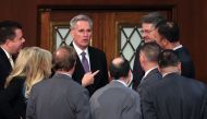 US House Republican Leader Kevin McCarthy talks to members-elect in the House Chamber during the second day of elections for Speaker of the House at the US Capitol Building on January 04, 2023 in Washington, DC. Win McNamee/Getty Images/AFP
