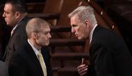 US Republican Representative from California Kevin McCarthy (right) speaks with Republican Representative from Ohio Jim Jordan as the US House of Representatives continues voting for new speaker at the US Capitol in Washington, DC, January 4, 2023.  (Photo by OLIVIER DOULIERY / AFP)
 