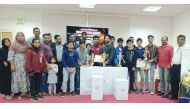 Winners of the Inter-Kerala Quiz Competition during the ceremony.