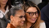 Brazil's First lady Rosangela 'Janja' da Silva (right) and Brazilian new Environment Minister Marina Silva during her swearing-in ceremony at the Planalto Palace in Brasilia on January 4, 2023. (Photo by EVARISTO SA / AFP)