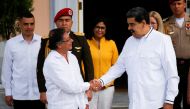 Venezuela's President Nicolas Maduro and his Colombian counterpart Gustavo Petro shake hands at Miraflores Palace, in Caracas, Venezuela, on January 7, 2023. REUTERS/Leonardo Fernandez Viloria