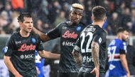 Napoli's Mexican forward Hirving Lozano (left) and Napoli's Nigerian forward Victor Osimhen react at the end of the Italian Serie A match between Sampdoria and Napoli on January 8, 2023 at the Luigi-Ferraris stadium in Genoa. (Photo by Andreas SOLARO / AFP)