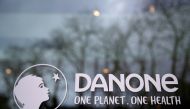 French food group Danone logo is seen at the company headquarters in Rueil-Malmaison near Paris, France, February 18, 2021. REUTERS/Gonzalo Fuentes/File Photo