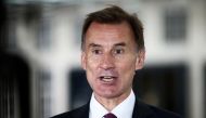 British Chancellor of the Exchequer Jeremy Hunt talks to a television crew outside the BBC headquarters in London, Britain, on November 18, 2022. File Photo / Reuters