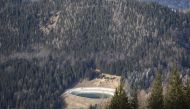 An almost empty water reservoir for the ski slope snowmaking system in the wintersport resort Zauberberg im Semmering, Lower Austria, is pictured on January 08, 2023. Many Alpine ski resorts have closed fully or partially because of the lack of snow and high temperatures as Europe has seen what experts have said is 