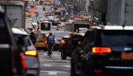 Traffic is pictured at twilight along 2nd Ave. in the Manhattan borough of New York, US, March 27, 2019. (REUTERS/Carlo Allegri)