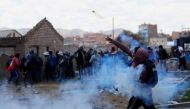 Demonstrators clash with security forces during a protest demanding early elections and the release of jailed former President Pedro Castillo, near the Juliaca airport, in Juliaca, Peru, January 9, 2023. (REUTERS/Hugo Courotto)