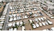 This aerial view shows a flooded neighborhood in Merced, California on January 10, 2023. (Photo by Josh Edelson / AFP)