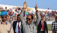 Somalia's President Hassan Sheikh Mohamud (centre) gestures as he attends a rally against the Al-Shabaab jihadist group in Mogadishu on January 12, 2023. (Photo by Hassan Ali Elmi / AFP)