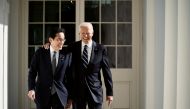 US President Joe Biden and Japanese Prime Minister Fumio Kishida on their way to the Oval Office at the White House, in Washington, US, January 13, 2023. (T.J. Kirkpatrick/Pool via REUTERS)
