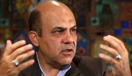 (Files) In this undated handout file picture provided by Khabar Online news agency shows, former Iranian deputy of defence minister, British-Iranian national Alireza Akbari, during an interview in Tehran. (Photo by Khabar Online / AFP) 
