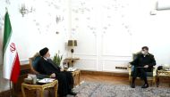 Iranian President Ebrahim Raisi meets with the new chief commander of the Iranian police force, Ahmad-Reza Radan in Tehran, Iran, January 14, 2023. Presidential Website/WANA (West Asia News Agency)/Handout via REUTERS