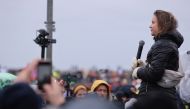 Climate activist Greta Thunberg speaks during a protest against the expansion of Germany's utility RWE's Garzweiler open-cast lignite mine to Luetzerath, Germany, on January 14, 2023. REUTERS/Thilo Schmuelgen