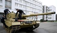 Members of the military walk on a tank, as Germany delivers its first Leopard tanks to Slovakia as part of a deal after Slovakia donated fighting vehicles to Ukraine, in Bratislava, Slovakia, on December 19, 2022.  File Photo / Reuters