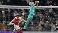 Arsenal's English goalkeeper Aaron Ramsdale catches the ball during the English Premier League match between Tottenham Hotspur and Arsenal at Tottenham Hotspur Stadium in London, on January 15, 2023. (Photo by ADRIAN DENNIS / AFP)