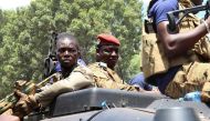 Burkina Faso's military leader Ibrahim Traore is escorted by soldiers while he stands in an armoured vehicle in Ouagadougou, Burkina Faso on October 2, 2022. File Photo / Reuters