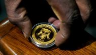 The 'Mosi-oa-Tunya' gold coin. (Jekesai Njikizana/AFP/Getty Images)