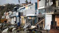 Houses along Beach Dr. in Seacliff that were damaged by flooding, in a region saturated after three weeks of storms, are seen in Aptos, California, U.S. January 16, 2023. REUTERS/Daniel Dreifuss