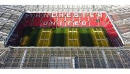 An aerial file photo taken on November 23, 2022 shows Old Trafford stadium, home ground of to Manchester United football team, in Manchester, northern England.  (Photo by Oli SCARFF / AFP)