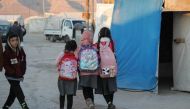 Displaced Iraqis from the Yazidi community are pictured at a camp for internally displaced persons (IDP) in the Sharya area, some 15 kms from the northern city of Dohuk in the autonomous Iraqi Kurdistan region, on January 17, 2023. (Photo by SAFIN HAMED / AFP)