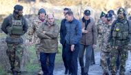 British Defence Secretary Ben Wallace walks, as he visits soldiers from the Armed Forces of Ukraine who are taking part in the UK-led basic training programme, on a military training camp, in an unspecified location in the North East of England, Britain, on November 9, 2022.  File Photo / Reuters