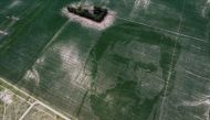 The face of Argentine football star Lionel Messi is depicted in a corn field sown with a special algorithm to plant seeds in a certain pattern to create a huge visual image when the corn plants grow, in Los Condores, on the outskirts of Cordoba, Argentina, January 15, 2023. (REUTERS/Agustin Marcarian)