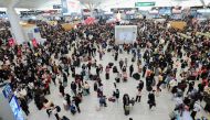 This photo taken on January 17, 2023 shows passengers arriving at Shenzhen North railway station during peak travel ahead of the Lunar New Year of the Rabbit, in China's southern Guangdong province. (Photo by CNS / AFP)