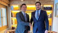 Minister of Commerce and Industry H E Sheikh Mohammed bin Hamad bin Qassim Al Thani with an official at the World Economic Forum in 
Davos, Switzerland.