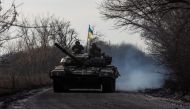 Ukrainian servicemen ride atop a tank near the frontline town of Bakhmut, amid Russia's attack on Ukraine, in Donetsk region, Ukraine, January 20, 2023. (REUTERS/Oleksandr Ratushniak)