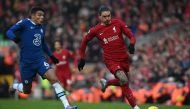 Chelsea's Brazilian defender Thiago Silva (left) fights for the ball with Liverpool's Uruguayan striker Darwin Nunez during the English Premier League football match between Liverpool and Chelsea at Anfield in Liverpool, north west England on January 21, 2023. (Photo by Paul ELLIS / AFP) 