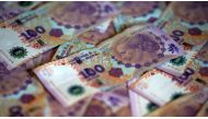 Argentine pesos: the new currency would at first run in parallel with the existing currencies © REUTERS
