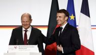 French President Emmanuel Macron and German Chancellor Olaf Scholz attend a joint news conference as part of a Franco-German joint cabinet meeting at the Elysee Palace in Paris, France January 22, 2023. REUTERS/Benoit Tessier/Pool