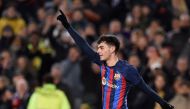 Barcelona's Spanish midfielder Pedri celebrates after scoring his team's first goal during the Spanish league football match between FC Barcelona and Getafe CF at the Camp Nou stadium in Barcelona, on January 22, 2023. (Photo by Josep LAGO / AFP)