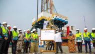 Ugandan President Yoweri Museveni (centre-left) alongside other local and government leaders launch the Kingfisher oil field in Kikuube district on January 24, 2023. (Photo by Stuart Tibaweswa / AFP)