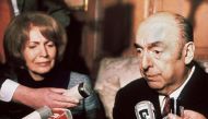 In this file photo taken on October 21, 1971 Chilean writer, poet and diplomat Pablo Neruda, then ambassador in France, answers journalists' questions, next to his wife at the Chilean embassy in Paris after being awarded the 1971 Nobel Literature Prize. (AFP)