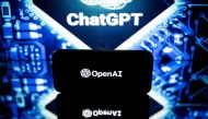 This picture taken on January 23, 2023 in Toulouse, southwestern France, shows screens displaying the logos of OpenAI and ChatGPT. - ChatGPT is a conversational artificial intelligence software application developed by OpenAI. (Photo by Lionel BONAVENTURE / AFP)