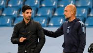 Manchester City manager Pep Guardiola and Arsenal manager Mikel Arteta react after a Premier League match at the Etihad Stadium, Manchester, Britain on June 17, 2020. File Photo / Reuters
