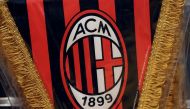 The AC Milan logo is pictured on a pennant in a soccer store in downtown Milan, Italy April 29, 2015. File Photo: REUTERS/Stefano Rellandini

