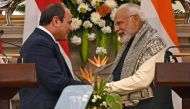 Egypt's President Abdel Fattah al-Sisi (left) shakes hands with India's Prime Minister Narendra Modi after their joint media briefing at the Hyderabad House in New Delhi on January 25, 2023. (Photo by Sajjad Hussain / AFP)