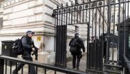 Police officers walk towards Downing Street, in London, Britain on February 12, 2022. File Photo / Reuters