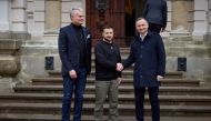 Ukrainian President Volodymyr Zelenskiy (C) welcomes Polish President Andrzej Duda (R) as Lithuanian President Gitanas Nauseda looks on, in Lviv, Ukraine, January 11, 2023. Ukrainian Presidential Press Service/Handout via REUTERS/File Photo
