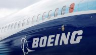 The Boeing logo is seen on the side of a Boeing 737 MAX at the Farnborough International Airshow, in Farnborough, Britain, July 20, 2022. (REUTERS/Peter Cziborra)