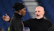 AC Milan's Rafael Leao and coach Stefano Pioli during the warm up before the Serie A match against Lazio at the Stadio Olimpico, Rome, Italy on January 24, 2023. REUTERS/Alberto Lingria

