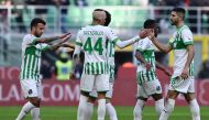 Sassuolo's players celebrate at the end of the Italian Serie A football match between AC Milan and Sassuolo, at the San Siro stadium in Milan, on January 29, 2023. (Photo by MIGUEL MEDINA / AFP)