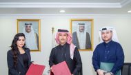 PSA Assistant President Mohammed Abdulaziz Al Naimi and General Manager of Microsoft Doha Lana Khalaf exchanging the MoU at  PSA premises.