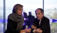 In this file photo taken on December 12, 2015, French president of the French Football Federation (FFF), Noel Le Graet (right), and FFF Marketing Director Florence Hardouin wait for the Federal Assembly of the organisation in Paris. (Photo by FRANCK FIFE / AFP)