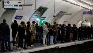 Passengers stand on a platform during a strike by Paris transport network (RATP) workers at Saint-Lazare metro station in Paris as part of a nationwide day of strike and protests against French government's pension reform plan in France, January 31, 2023. Reuters/Sarah Meyssonnier