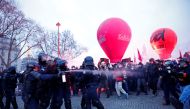 French police face off with protesters amid clashes near the Invalides during a demonstration against French government's pension reform plan in Paris as part of a national strike and protests in France, on January 31, 2023. REUTERS/Gonzalo Fuentes
 