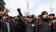 Police officers chant slogans as they protest to condemn the suicide blast in a mosque in Peshawar, Pakistan February 1, 2023. REUTERS/Fayaz Aziz